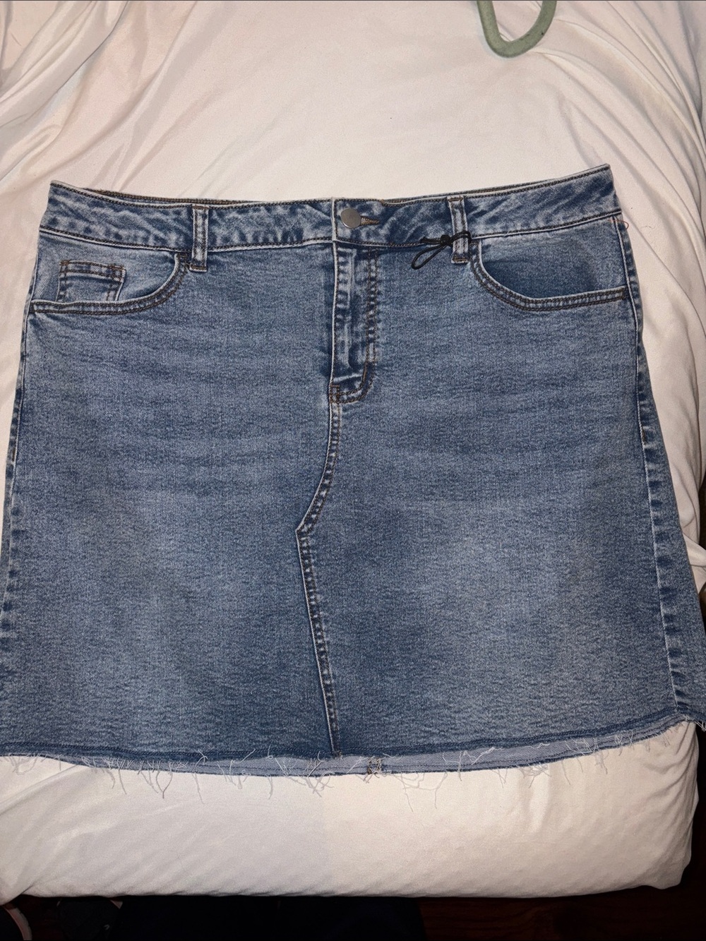 Women’s size 16 Light Wash Denim Mini Skirt with Raw Hem